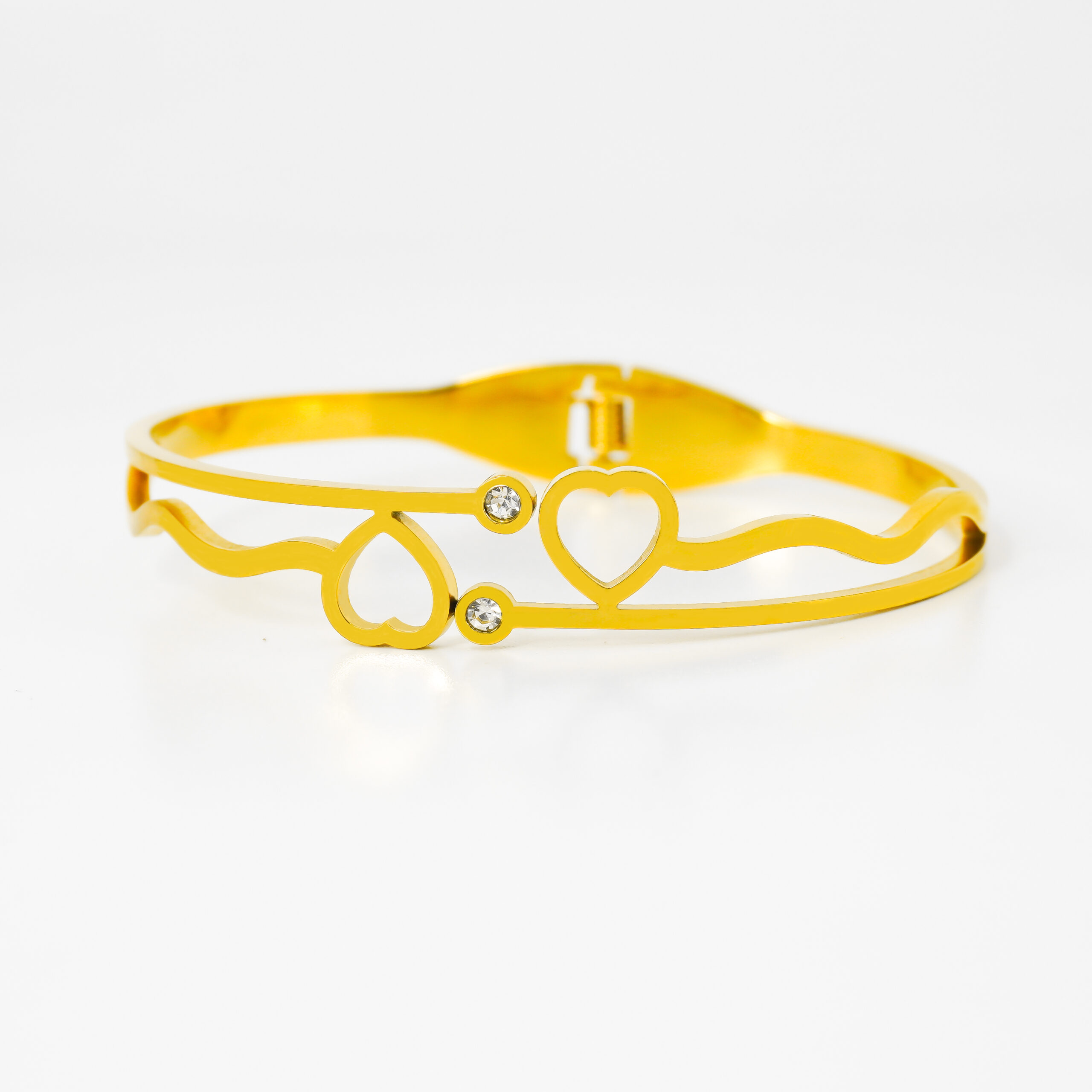 Elegant Gold-Tone Double Heart Bracelet with Minimal Crystal Accents